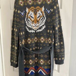 Unique drifter sweater with tiger detail on back.